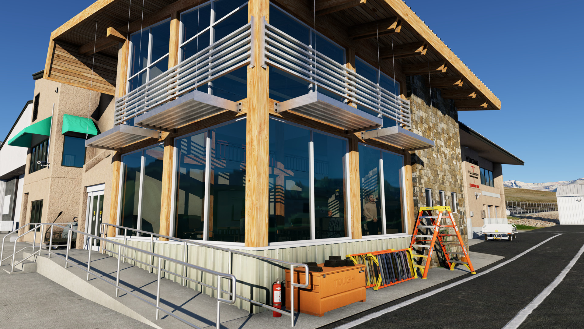 Terminal expansion exterior at KTEX Telluride Regional Airport in X-Plane 12 with large glass window framed by rich orange wood looking into the beautiful modern cozy country interior