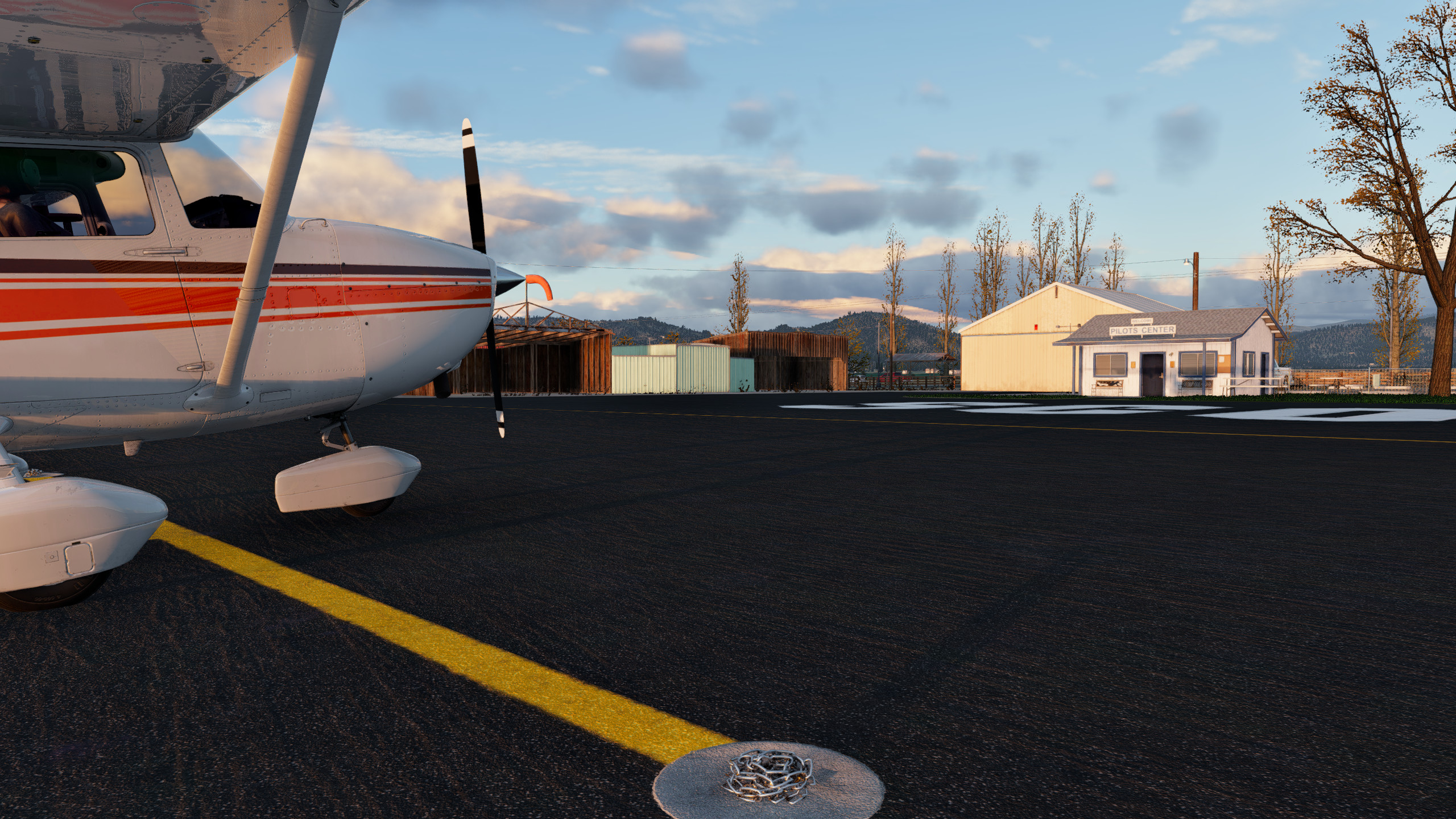 small aircraft parked on the Scott Valley apron for Scott Valley Airport (A30) by X-Codr Designs in X-Plane