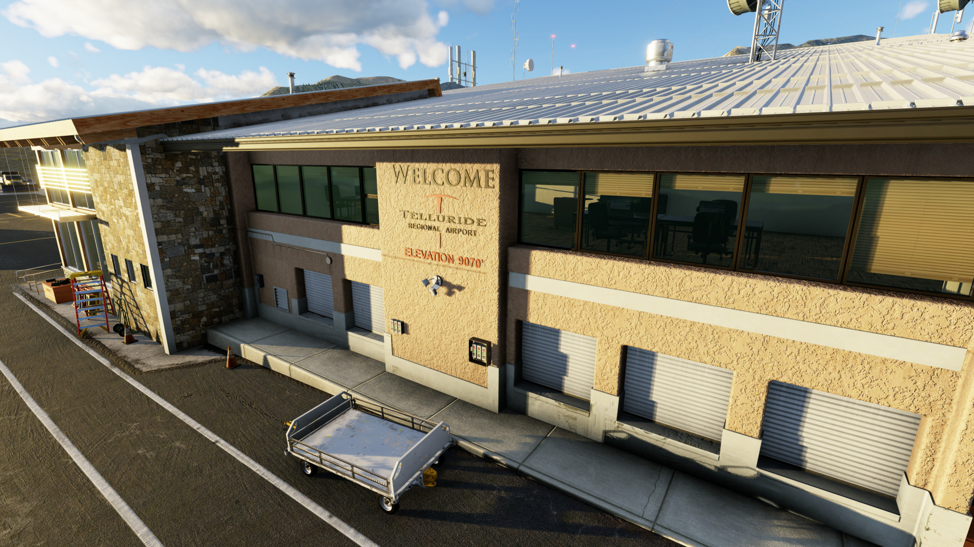 Front of terminal with Telluride logo at KTEX Telluride Regional Airport in X-Plane 12